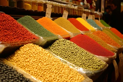 Colorful Piles of Spices and Legumes at Market