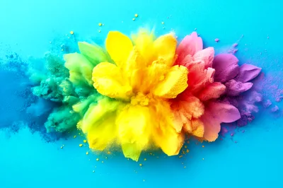 Vibrant Rainbow Colored Powder Explosion On Blue Background