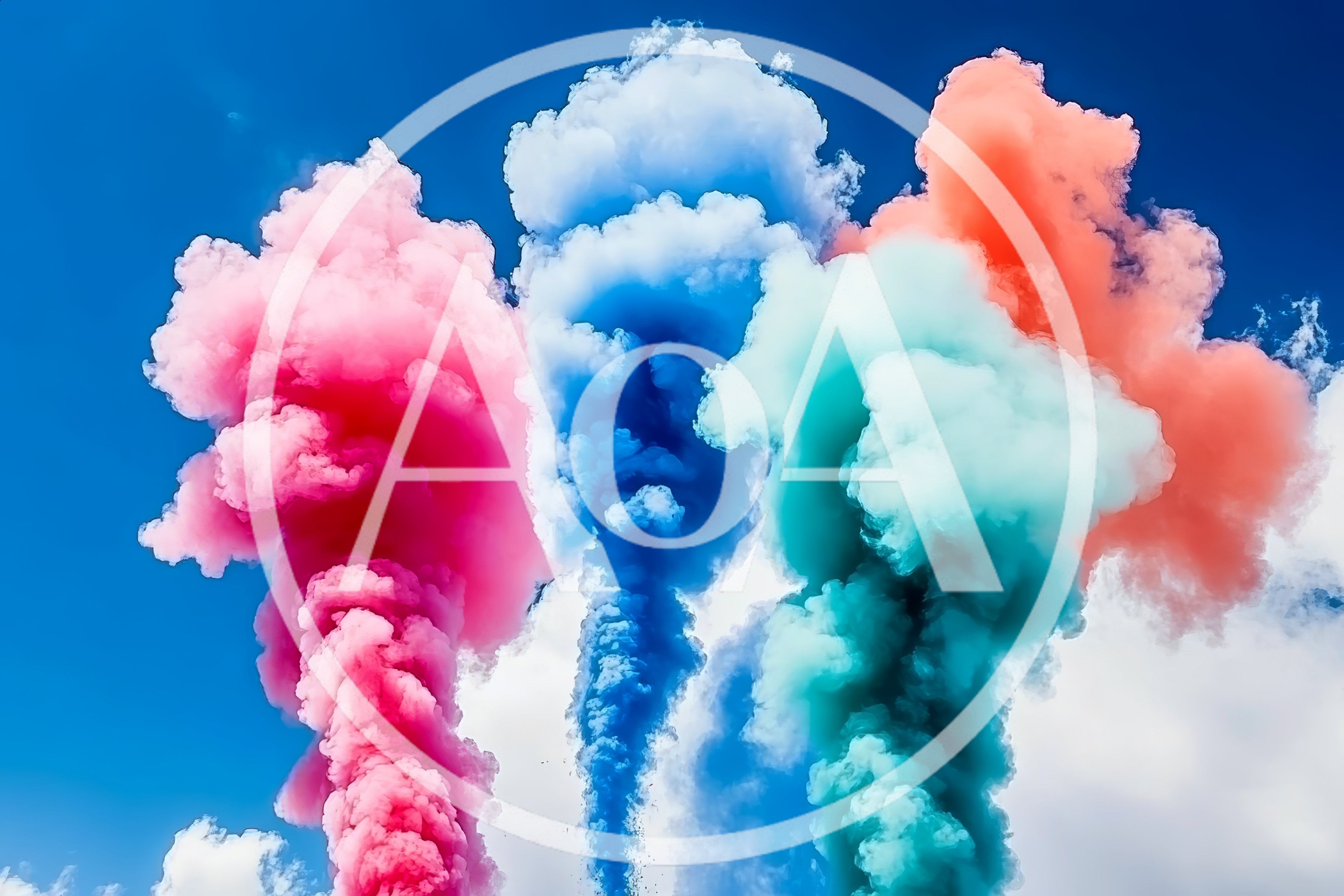 Three Vibrant Colored Smoke Plumes Against Blue Sky