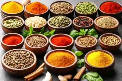 Assorted Spices and Herbs in Wooden Bowls