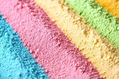 Diagonal Rows of Vibrant Colored Holi Powder