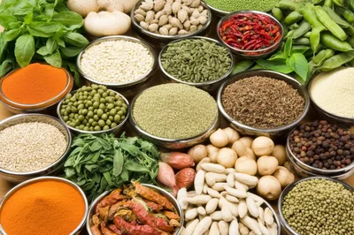 Assorted Spices And Herbs In Metal Bowls