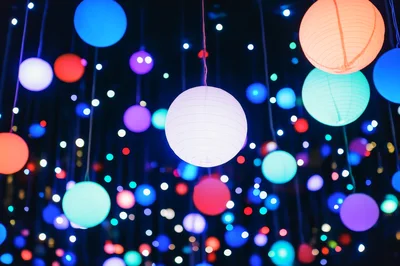 Colorful Hanging Paper Lanterns In Dark Room