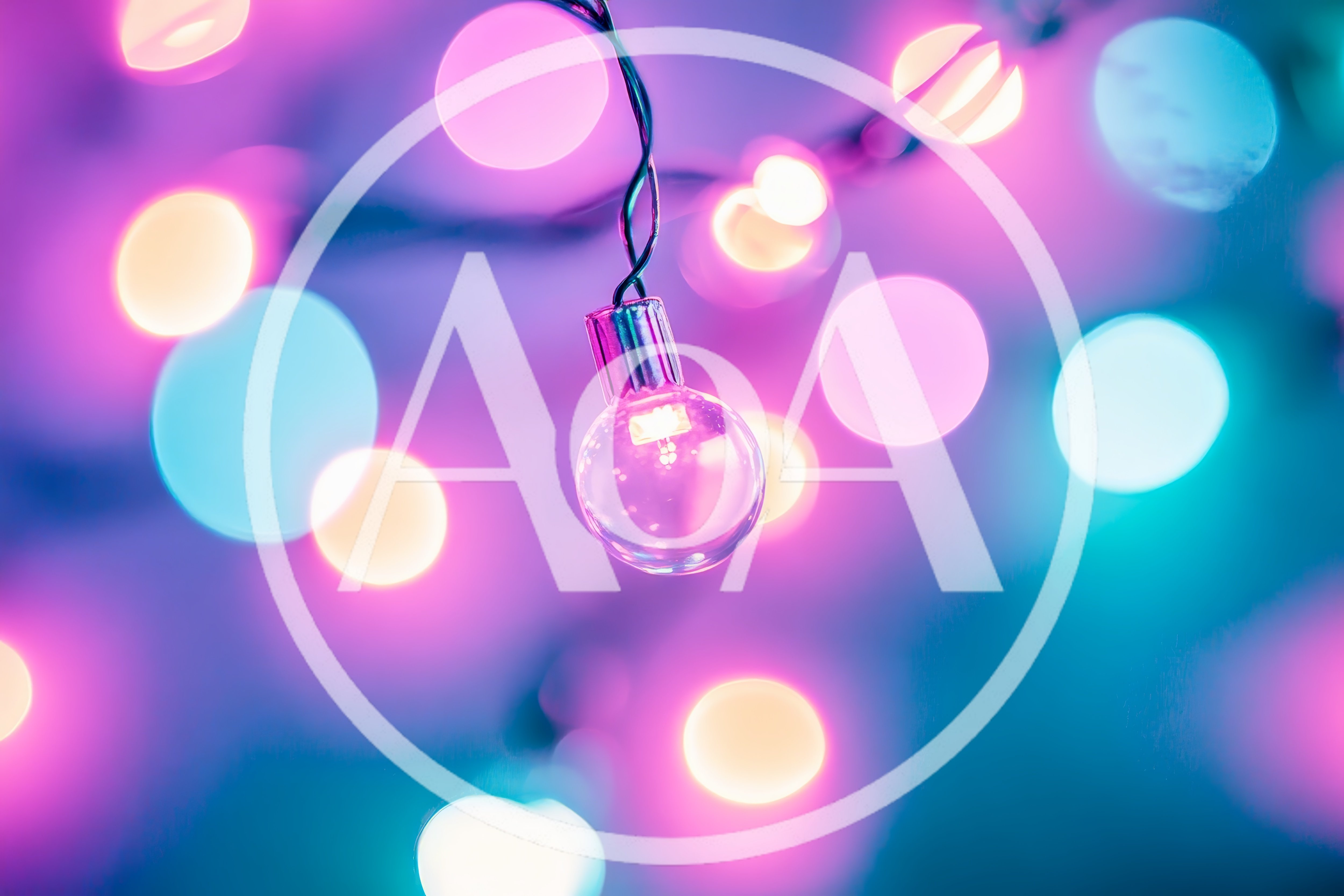 Single Glowing Light Bulb With Colorful Bokeh Background
