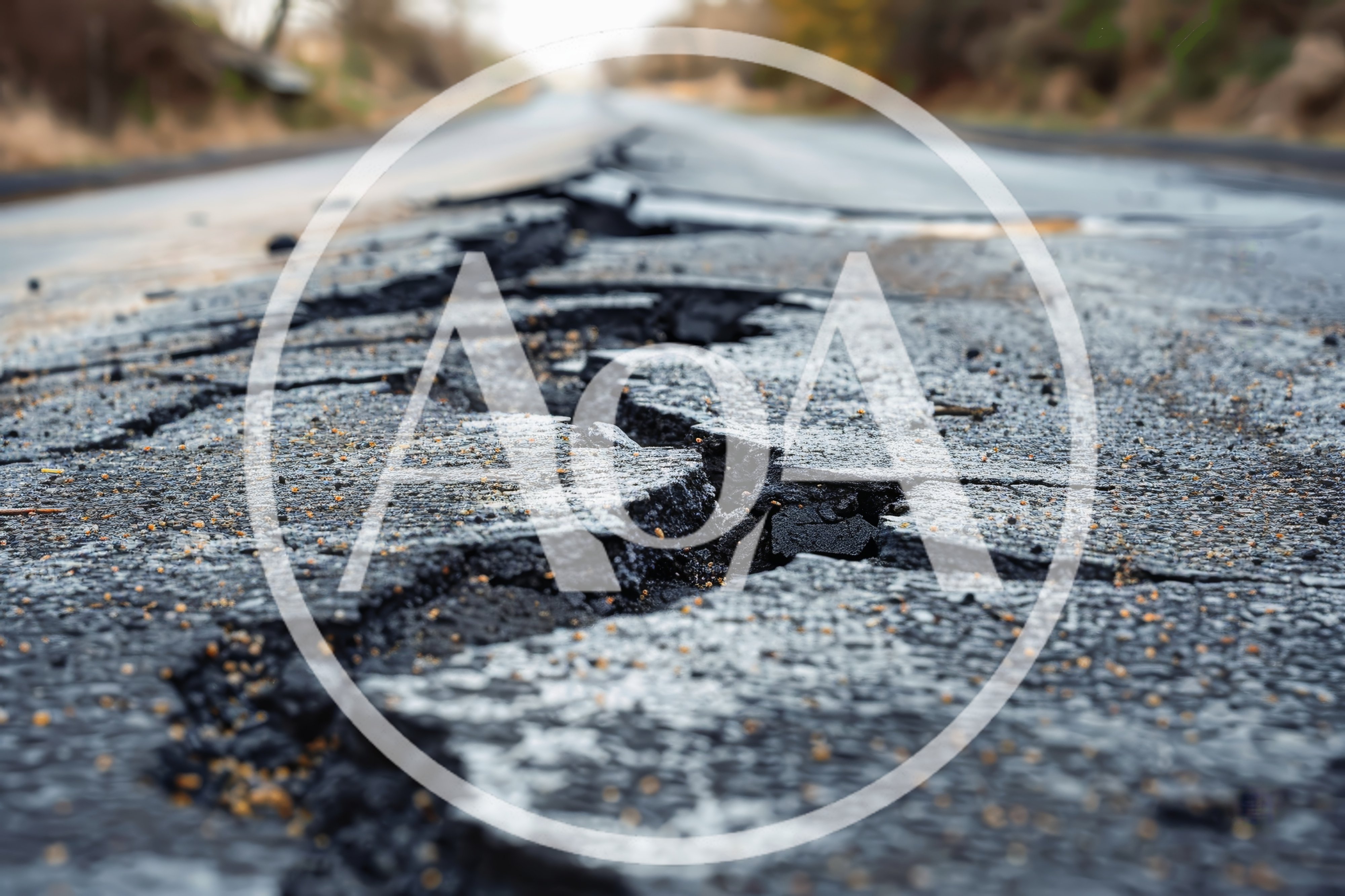 Cracked Asphalt Road Surface After Earthquake Damage