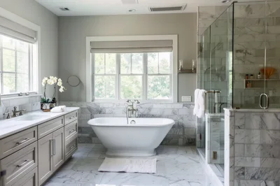 Modern Luxury Bathroom With Freestanding Bathtub And Marble Tiles