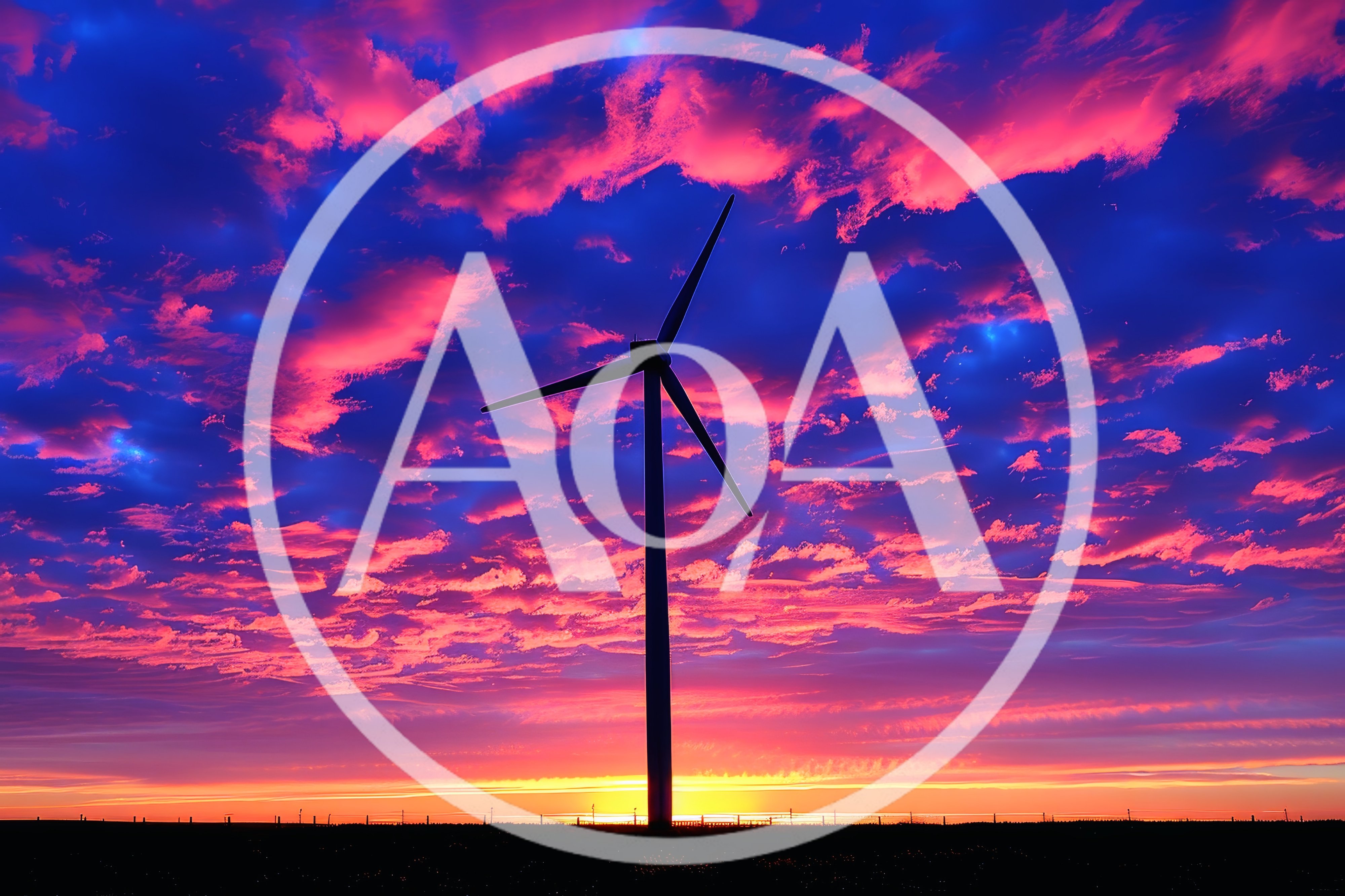 Wind Turbine Silhouette Against A Vibrant Sunset Sky