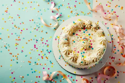 Top View Of A Festive Birthday Cake With Confetti