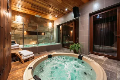 Luxury Spa Room With Circular Hot Tub And Sauna