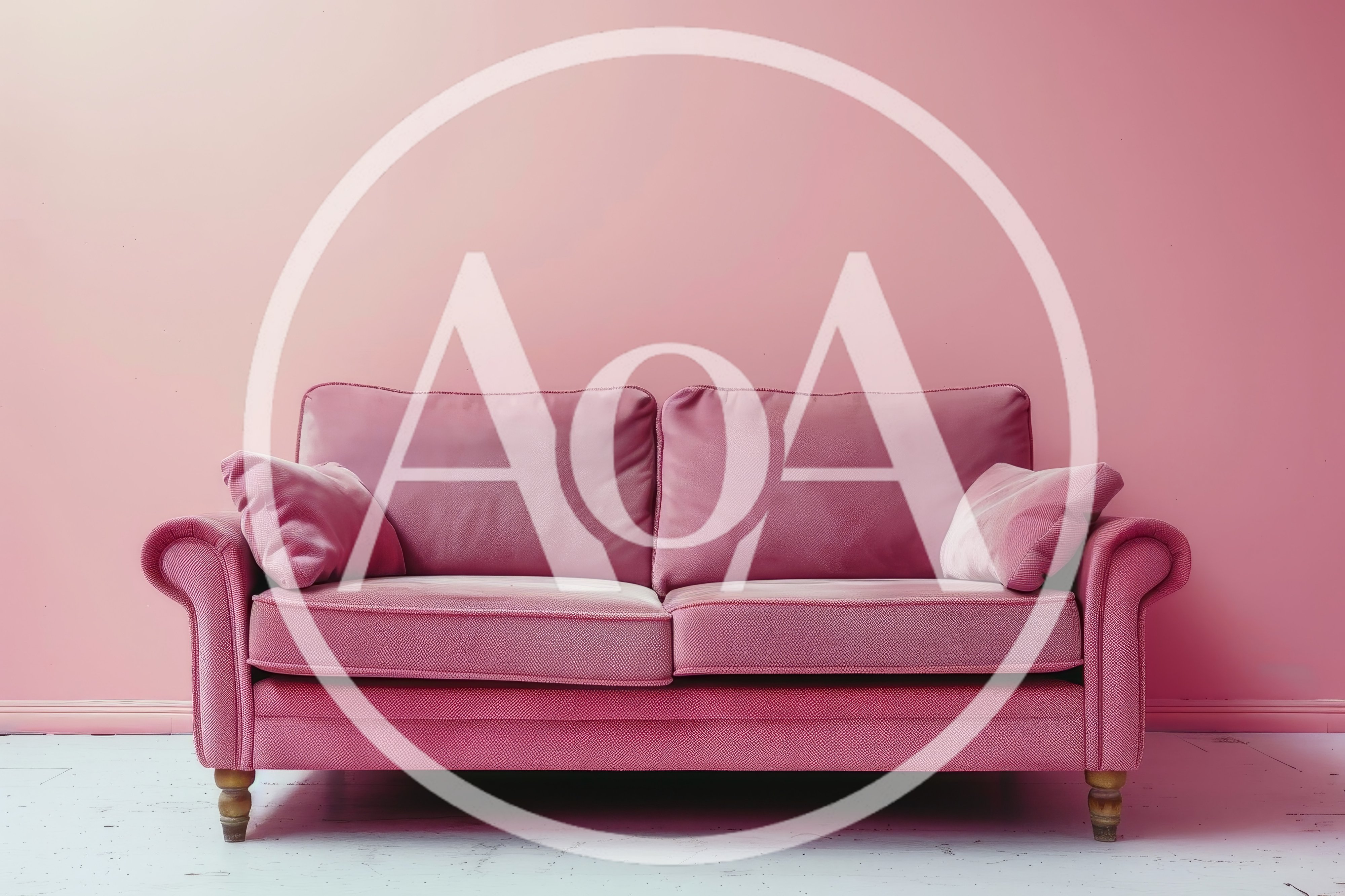 Pink Velvet Sofa Against A Pink Wall