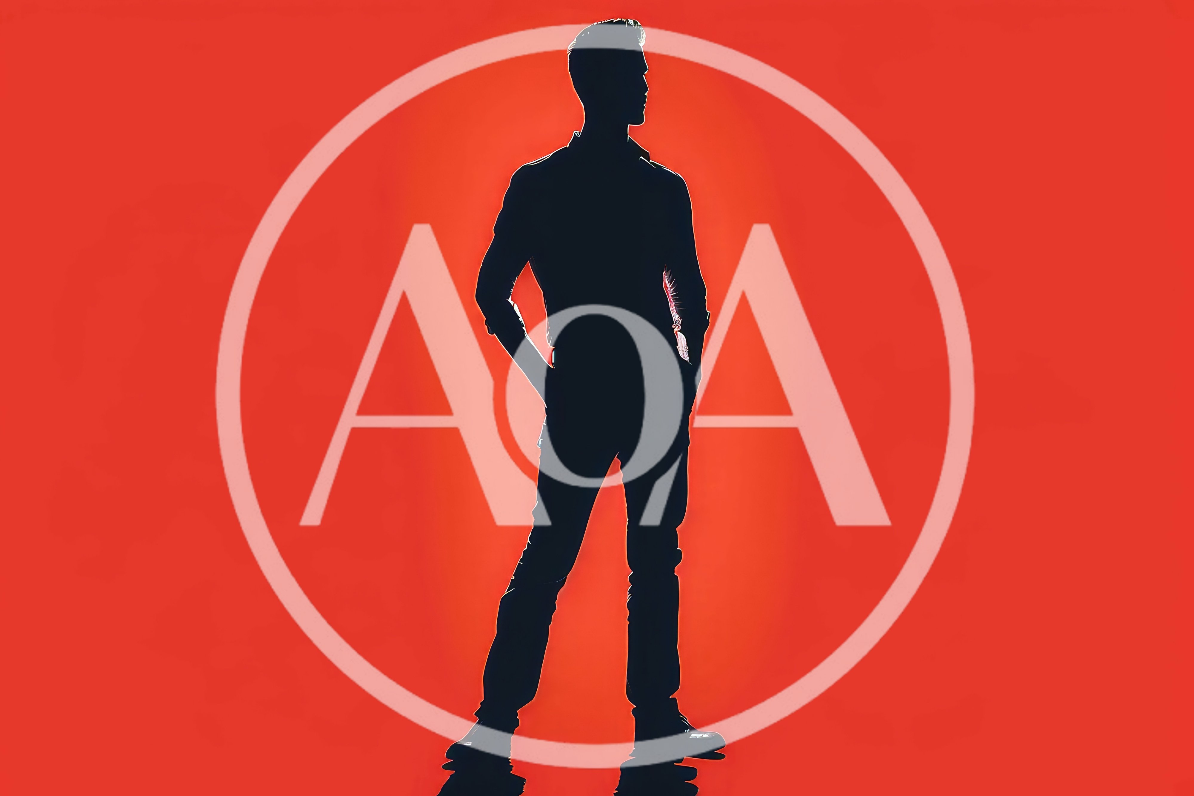 Silhouette Of A Man Standing Against Red Background
