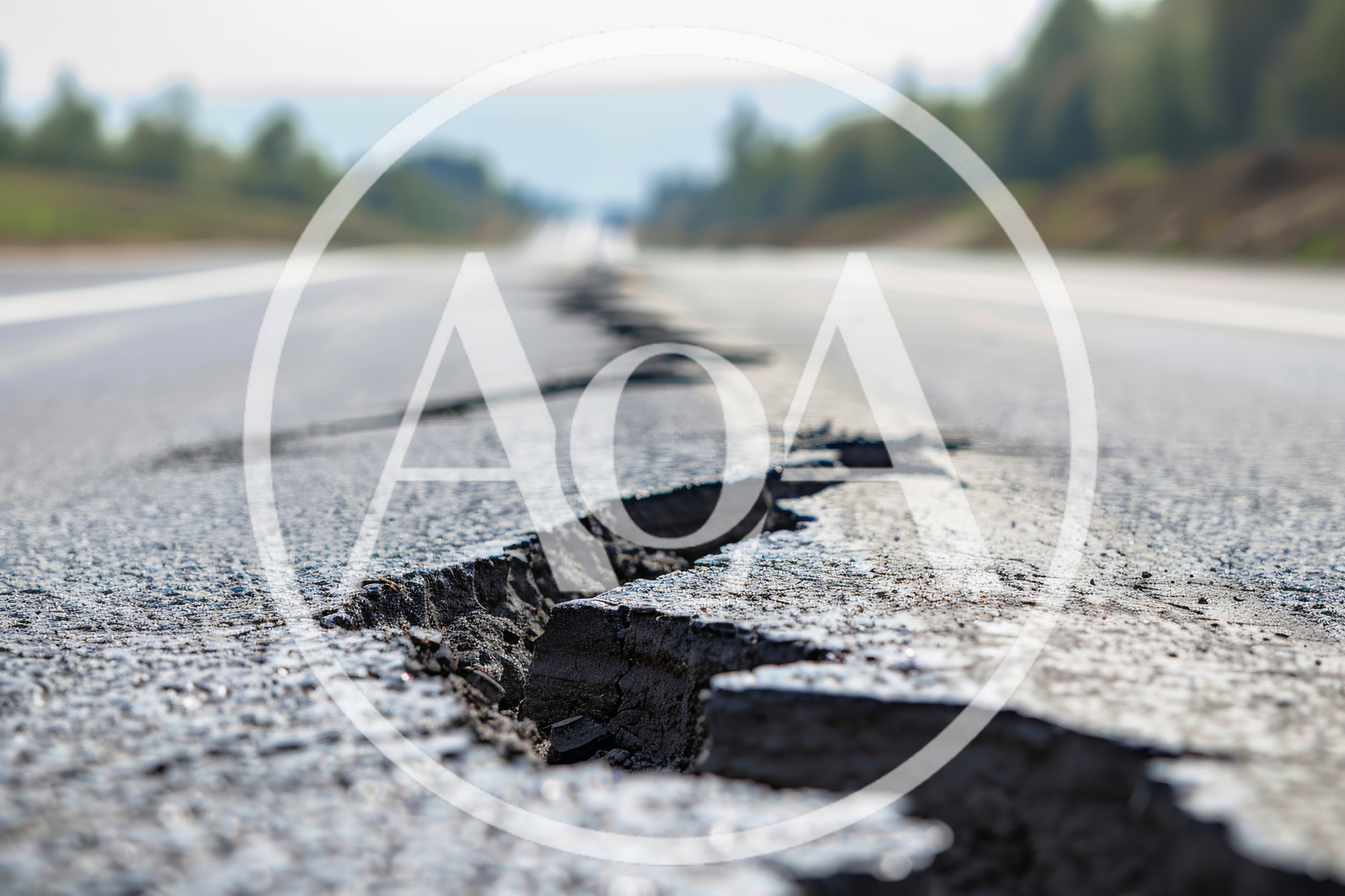 Deep Longitudinal Crack In Asphalt Road Surface