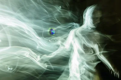 Ethereal Human Silhouette With Glowing Energy Trails