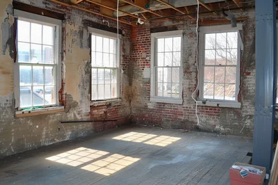 Renovated Industrial Loft Interior With Exposed Brick Walls