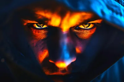 Close Up Portrait Of A Man In A Hood