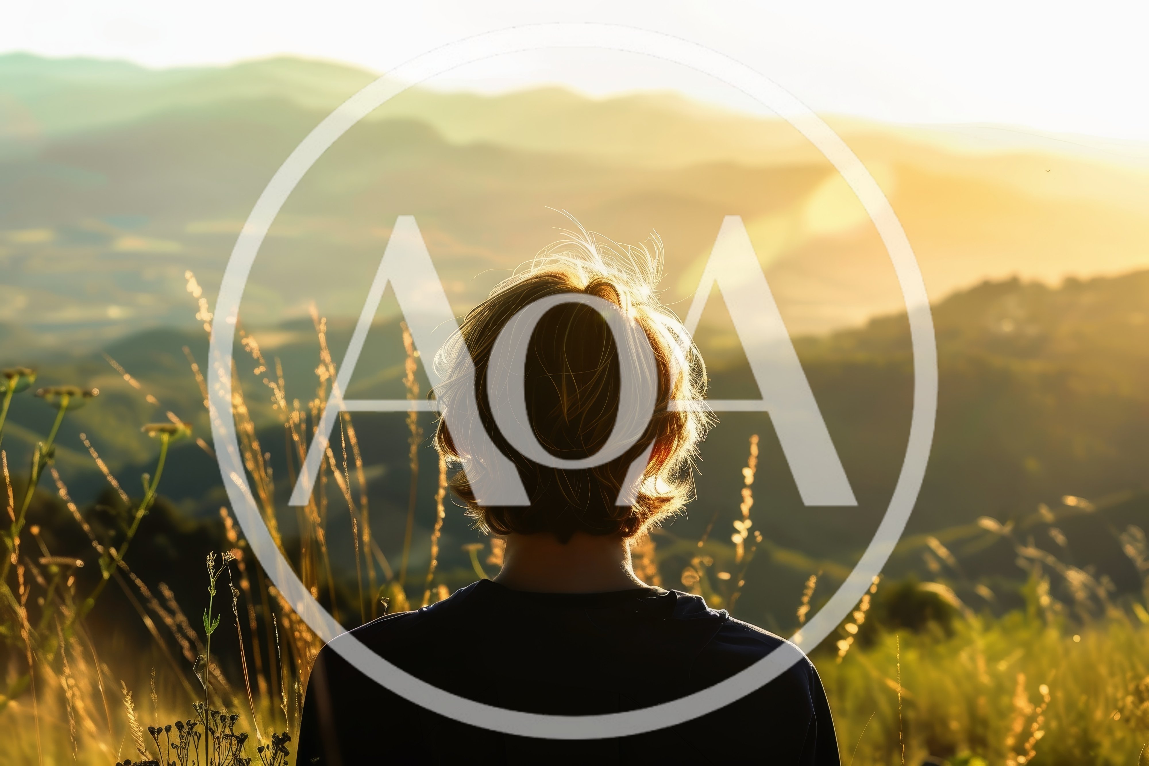 Person Looking Over Rolling Hills At Sunset
