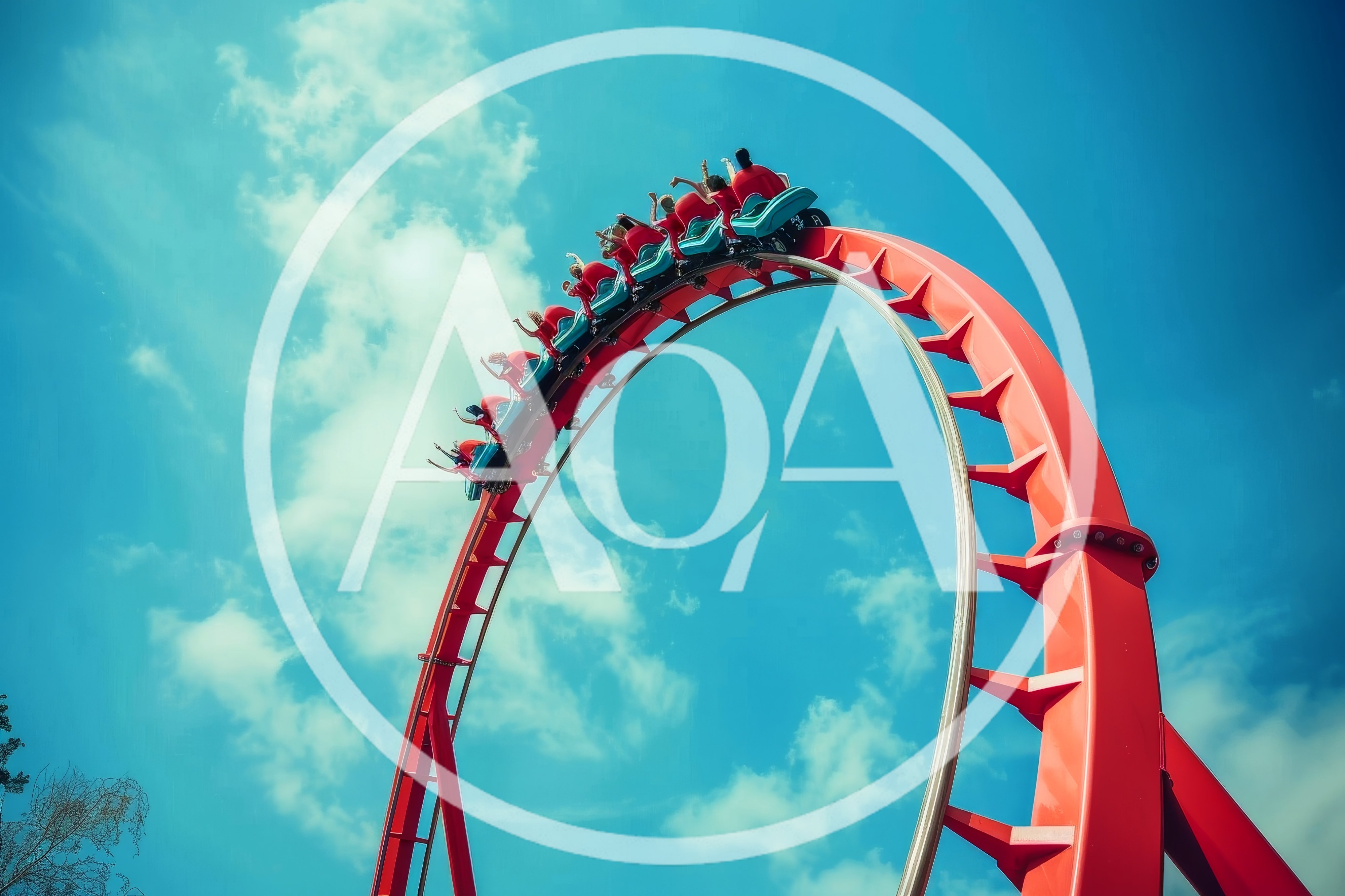 Roller Coaster Train Inverted Loop Against Blue Sky