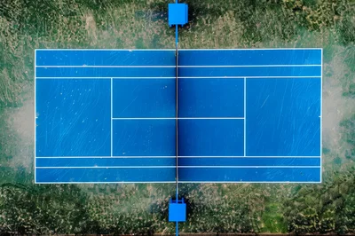 Aerial View Of A Blue Tennis Court