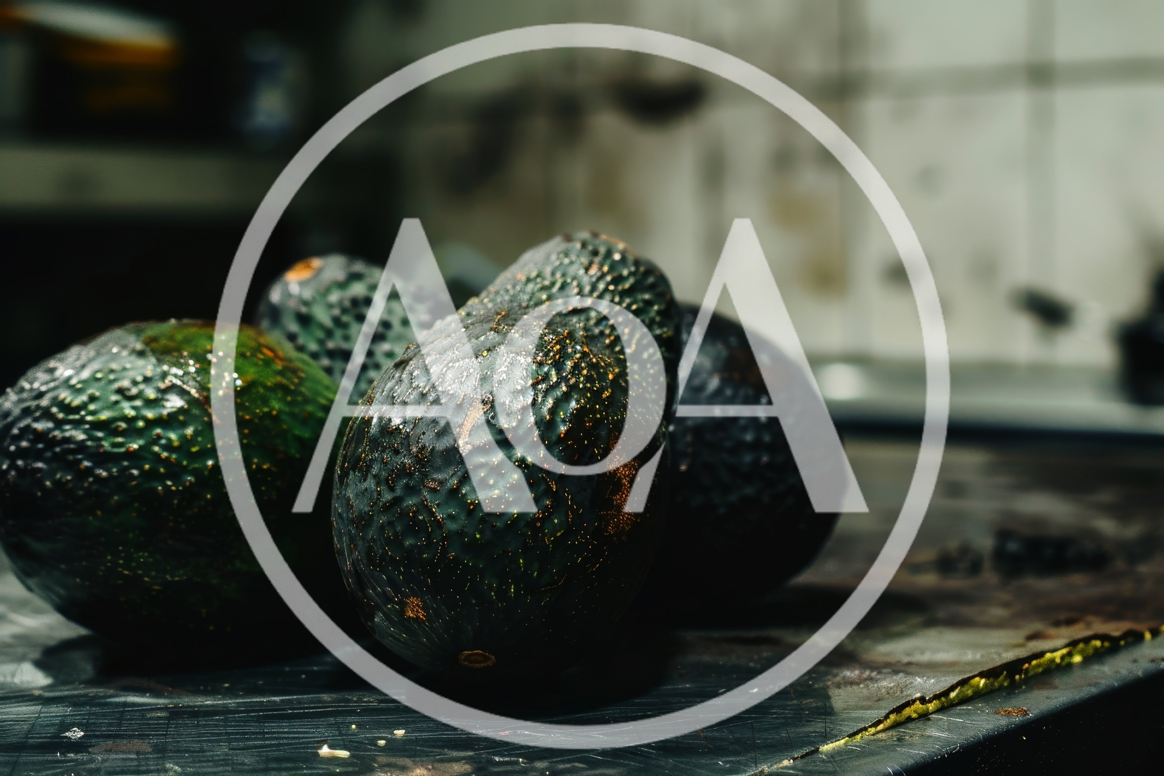 Fresh Ripe Avocados Resting On A Kitchen Counter
