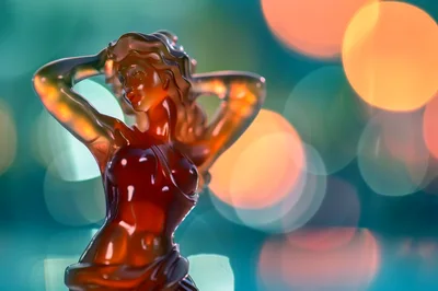 Translucent Amber Figurine Of A Woman Posing