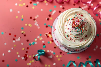 Top View Of A Birthday Cake With Confetti