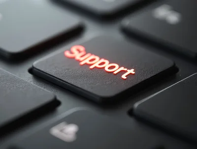 Glowing Support Key On A Modern Computer Keyboard