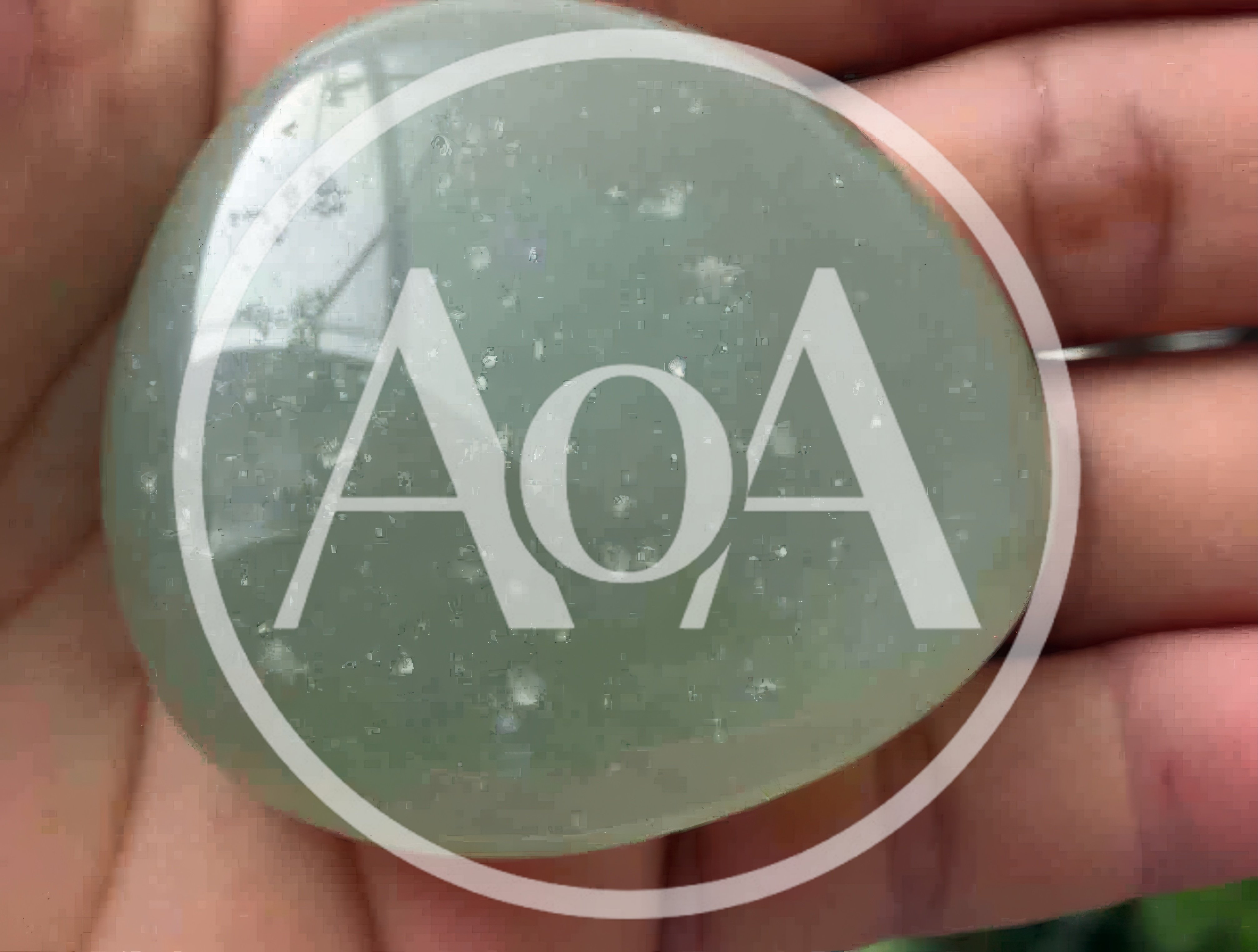 Polished Green Aventurine Crystal Held In Hand