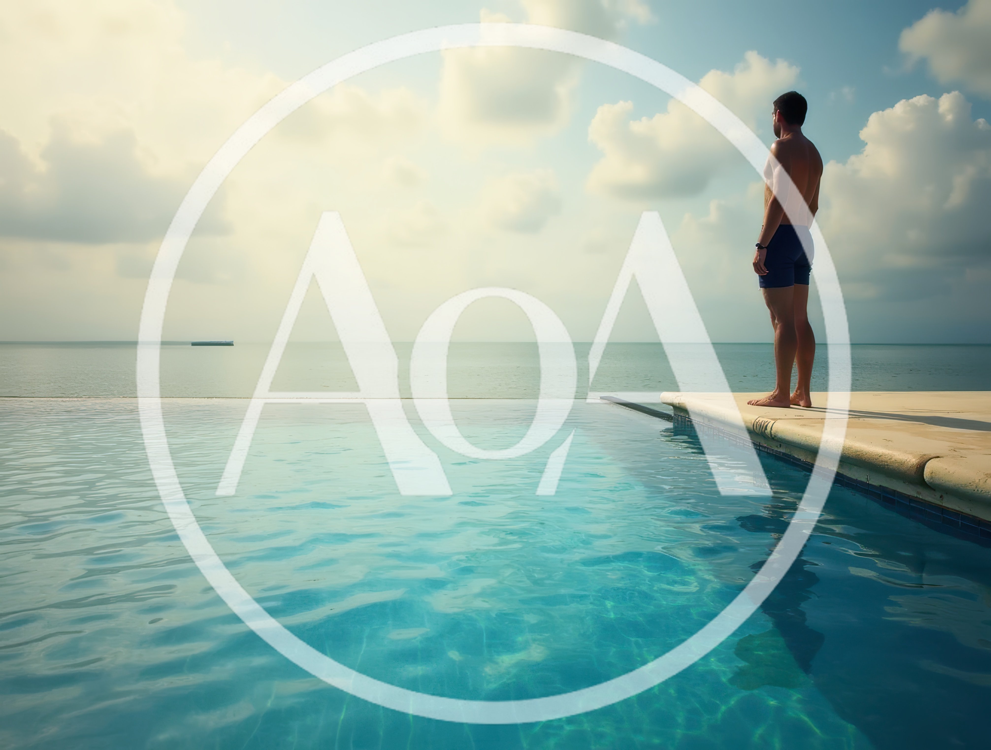Man Standing At The Edge Of An Infinity Pool
