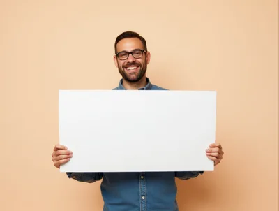 Smiling Man Holding Blank White Sign