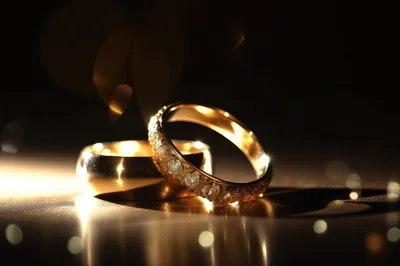 Two Elegant Gold Wedding Rings With Sparkling Diamonds