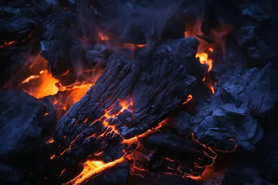 Glowing Hot Charcoal Embers Burning In A Fireplace