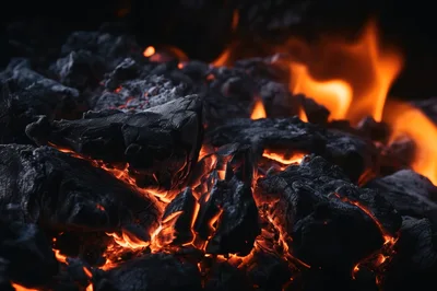 Glowing Hot Charcoal Embers In A Fireplace