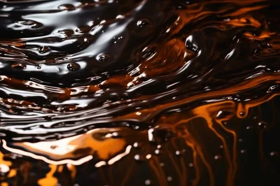 Abstract Liquid Flow Of Molten Dark Chocolate And Caramel
