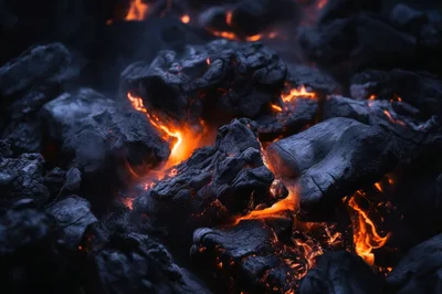 Glowing Hot Charcoal Embers In A Fire Pit