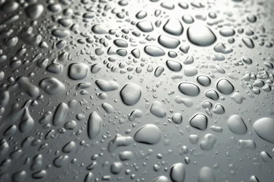 Water Droplets On A Smooth Metallic Surface