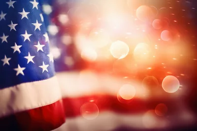 American Flag With Bokeh Light Background