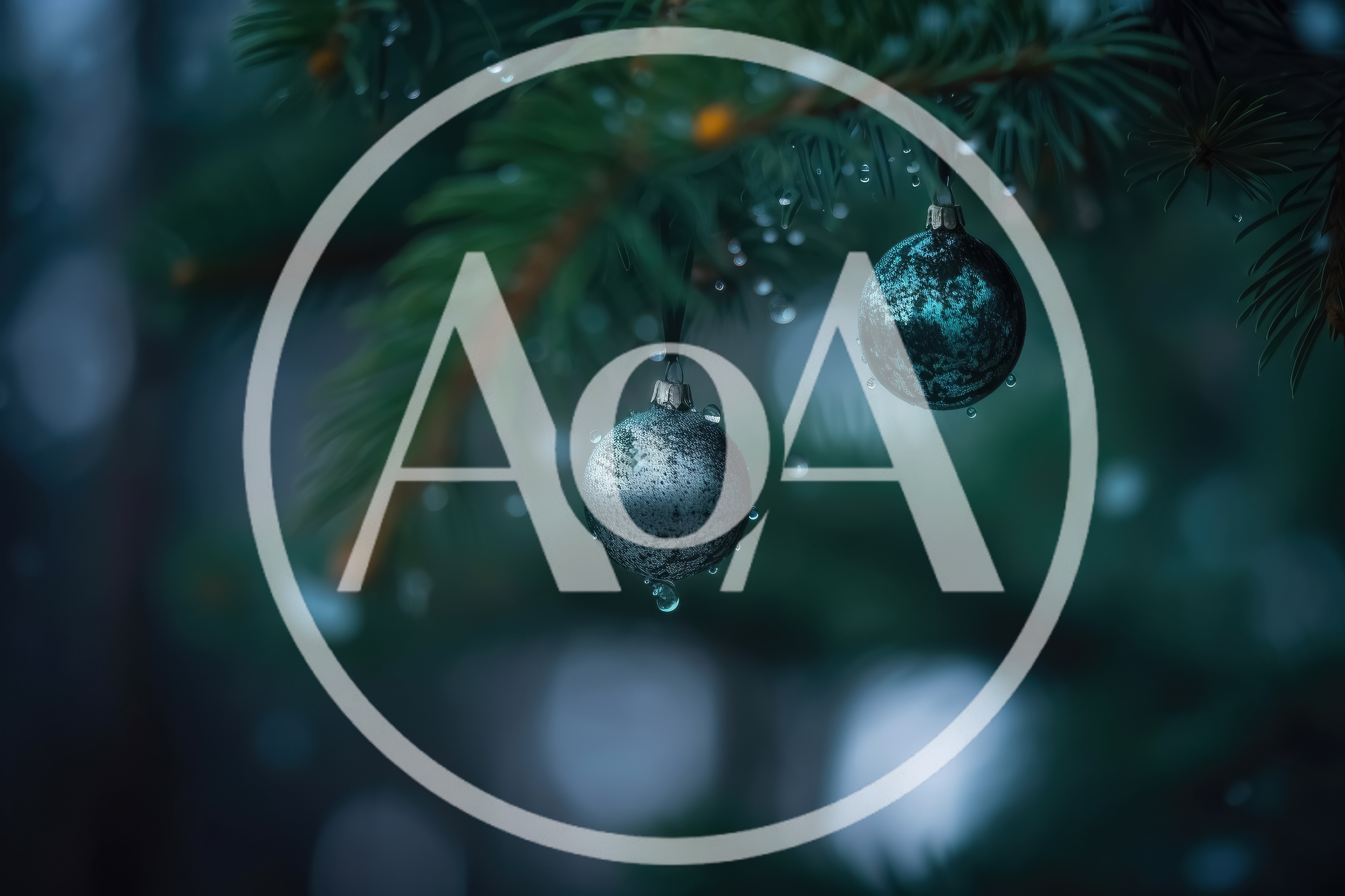 Two Decorative Christmas Ornaments Hanging On Pine Tree Branch