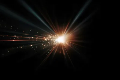 Abstract Light Burst With Glowing Particles And Streaks