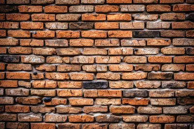 Weathered Red Brick Wall Texture Background