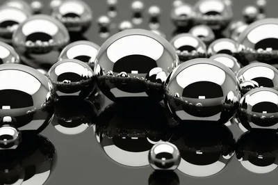Abstract Chrome Spheres Reflecting On A Dark Surface
