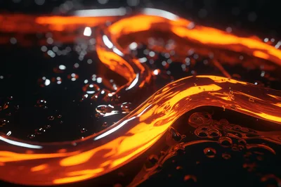 Molten Orange Liquid Flowing Over Dark Surface