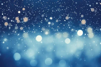 Abstract Blue Background With Bokeh Lights And Snow