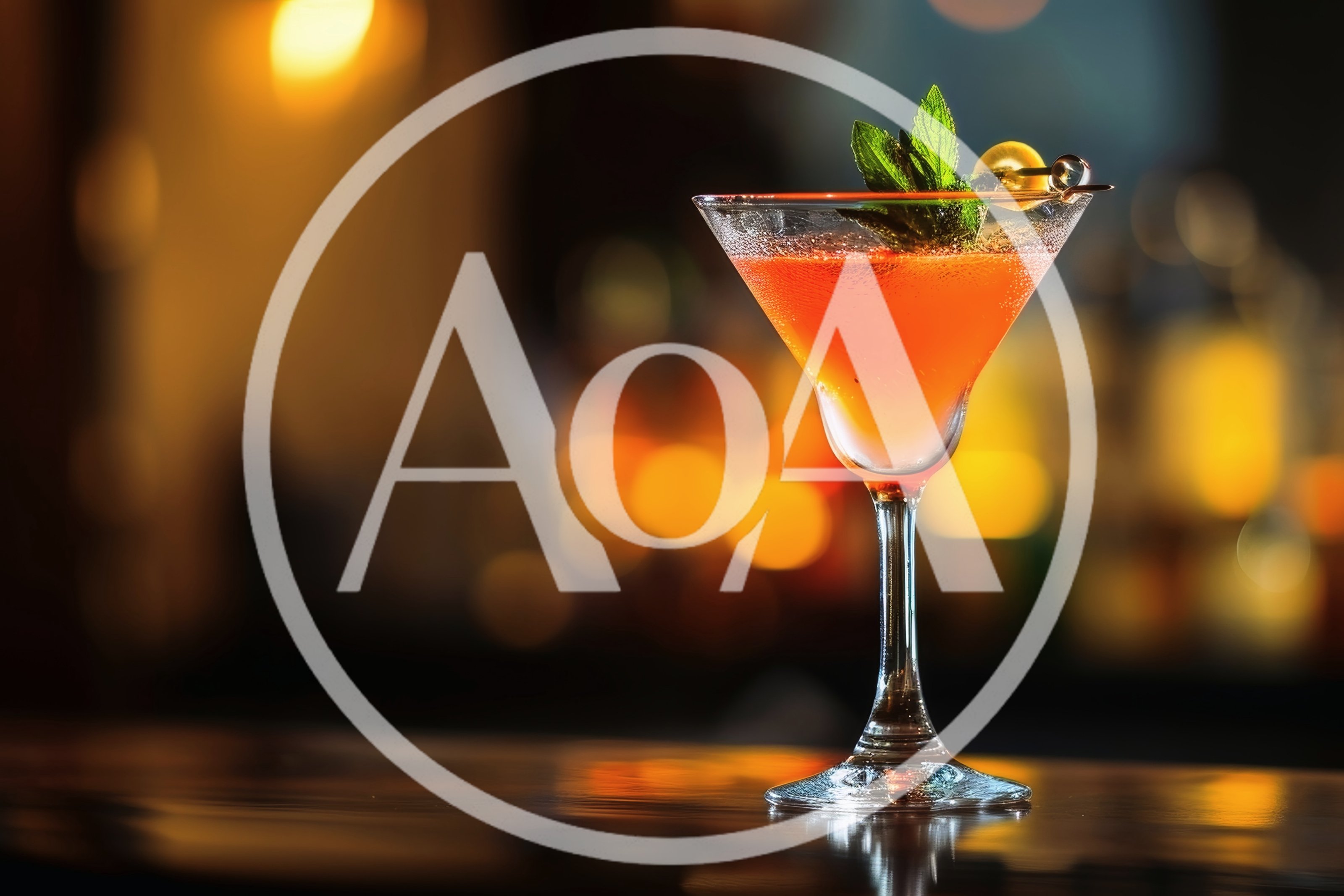 Vibrant Orange Cocktail With Mint Garnish