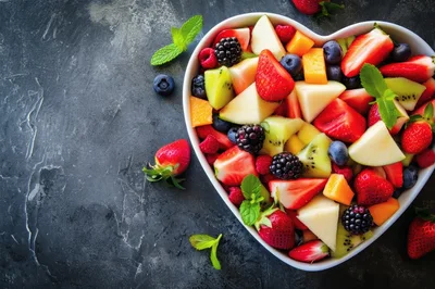 Heart Shaped Bowl Of Fresh Fruit Salad