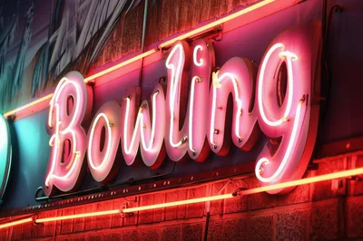 Neon Bowling Sign Glowing At Night