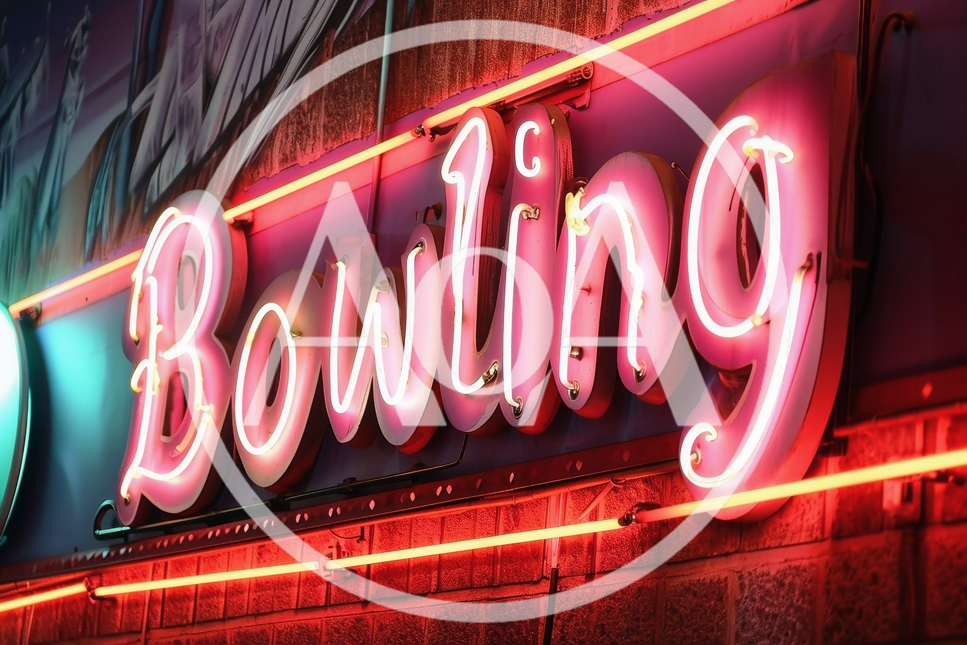 Neon Bowling Sign Glowing At Night