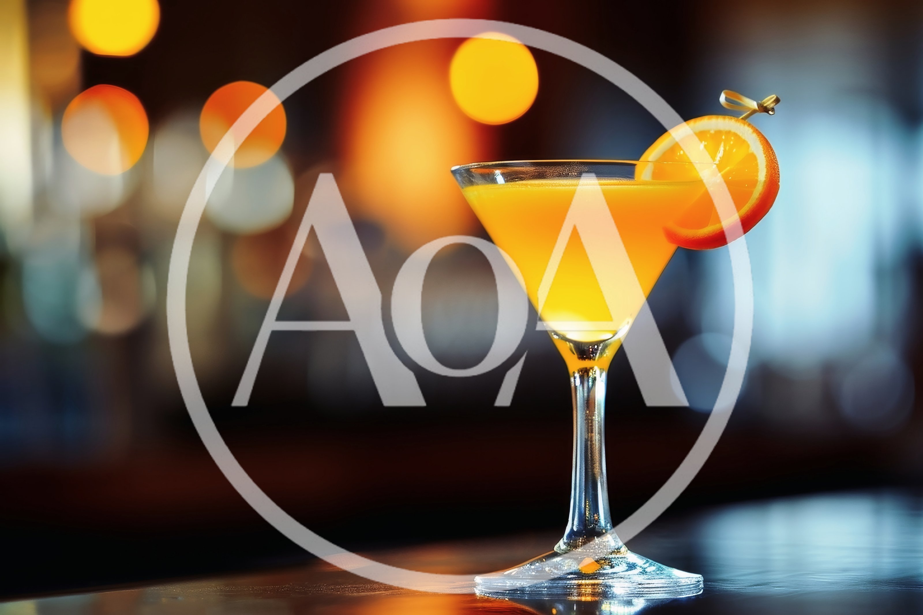 Orange Cocktail In A Martini Glass On A Bar
