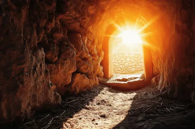 Sunlight Shining Through Ancient Stone Cave Entrance