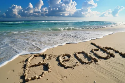 Beach Word Written In Sand On Tropical Shoreline