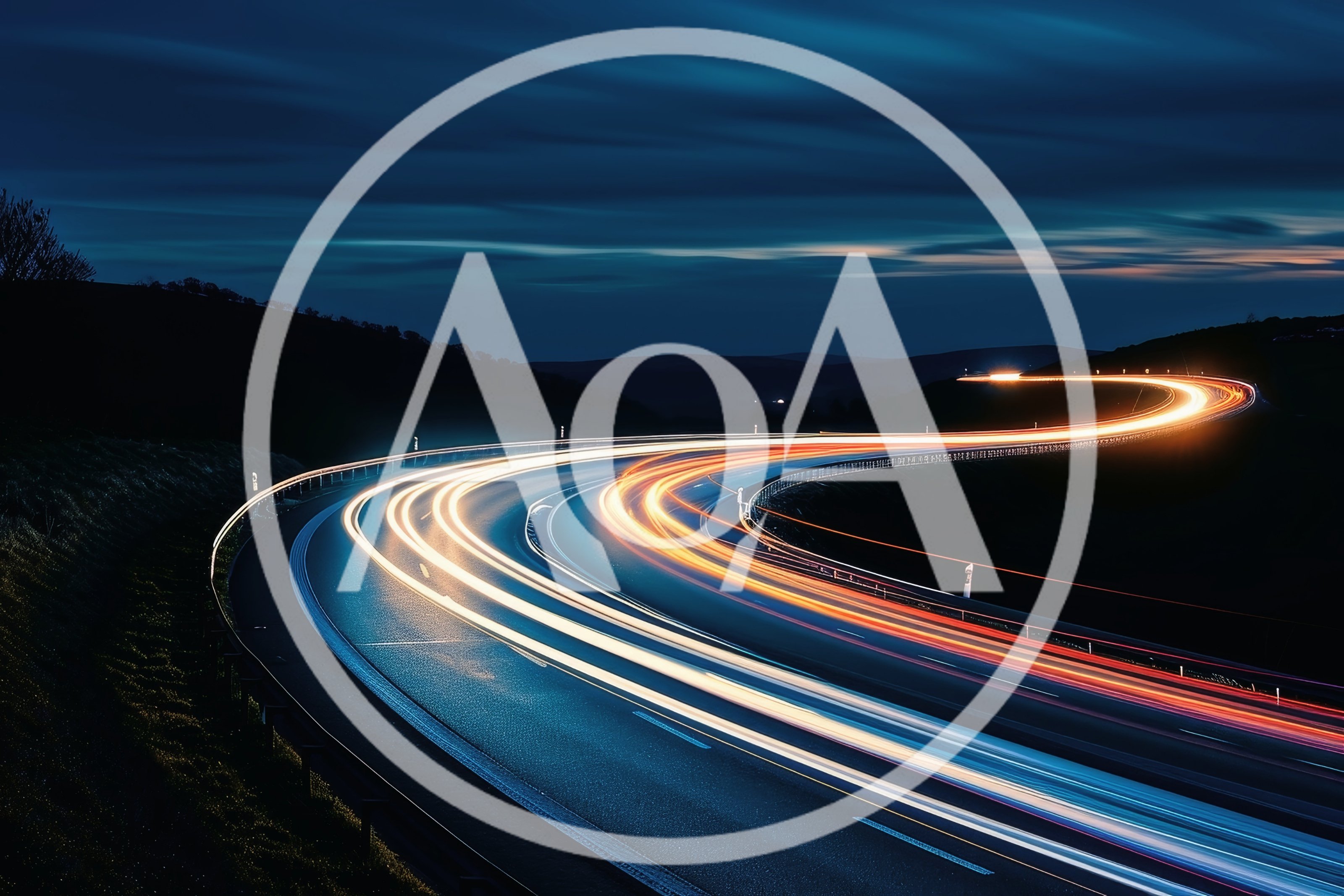 Long Exposure Light Trails On A Winding Highway